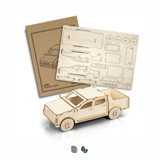 A wooden model of a UTE, featuring a detailed design in natural wood colour, accompanied by assembly instructions.